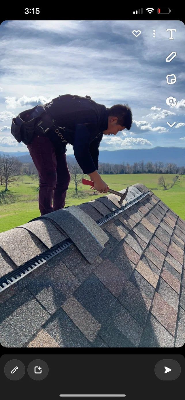 Worker attending to roof installation details